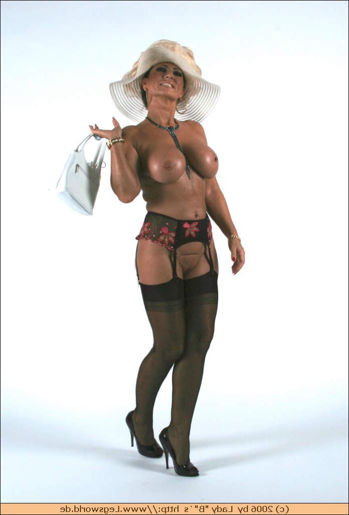 12P Busty german lady in black stockings