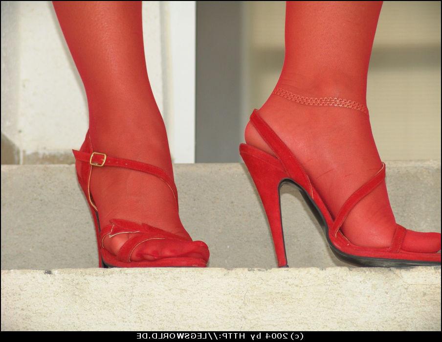 12P Leggy glamour lady in red stockings and heels