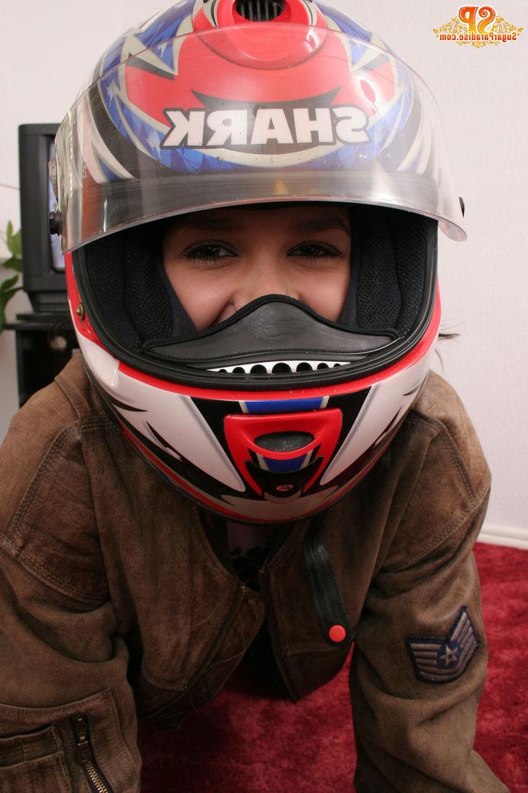 20P Naked lass in a crash helmet