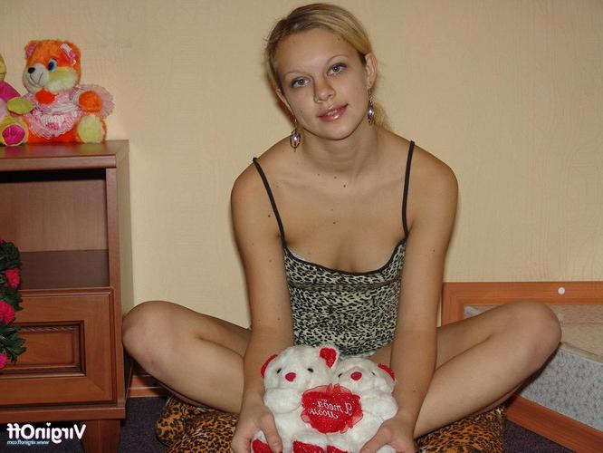 17P Beautiful young blonde lady spreading her petite pink pussy lips