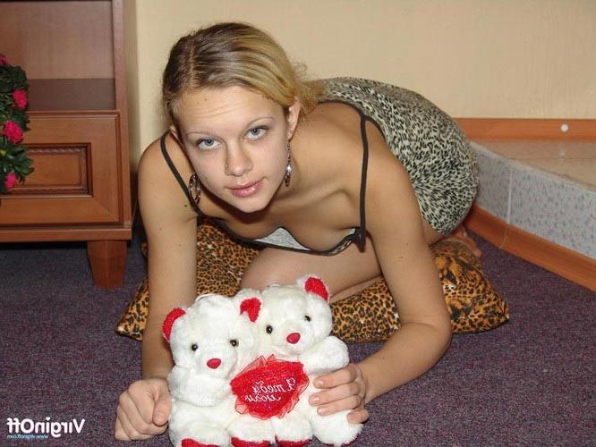17P Beautiful young blonde lady spreading her petite pink pussy lips
