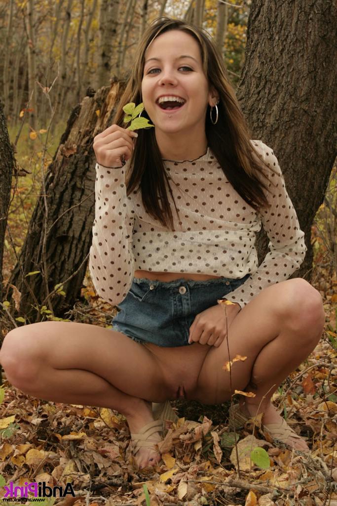 16P Smiling teen flashing pussy and tits in woods