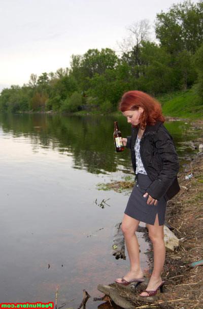15P Redhead slut peeing near river after beer drinking