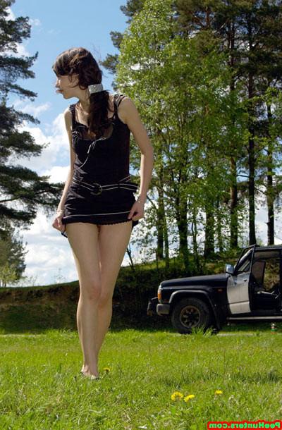 16P Young brunette babe peeing at the nature