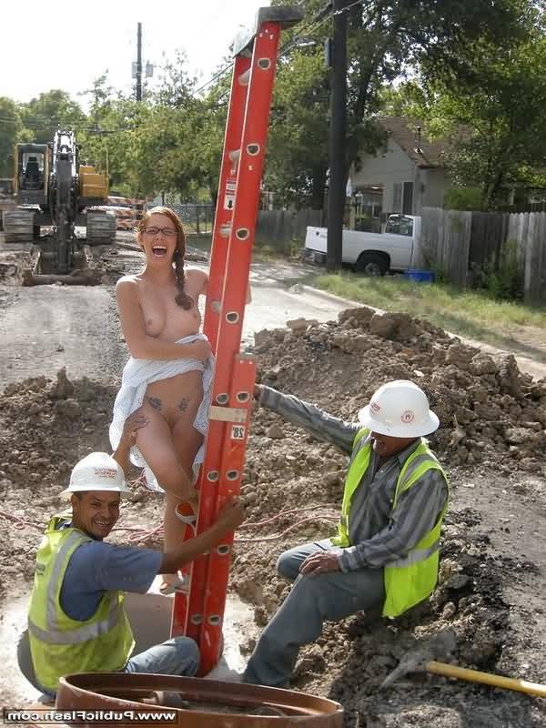16P Redhead in glasses flashing for grinning work crew