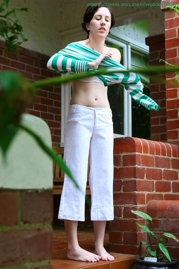 16P Spying on slim brunette getting dressed outdoors on a porch