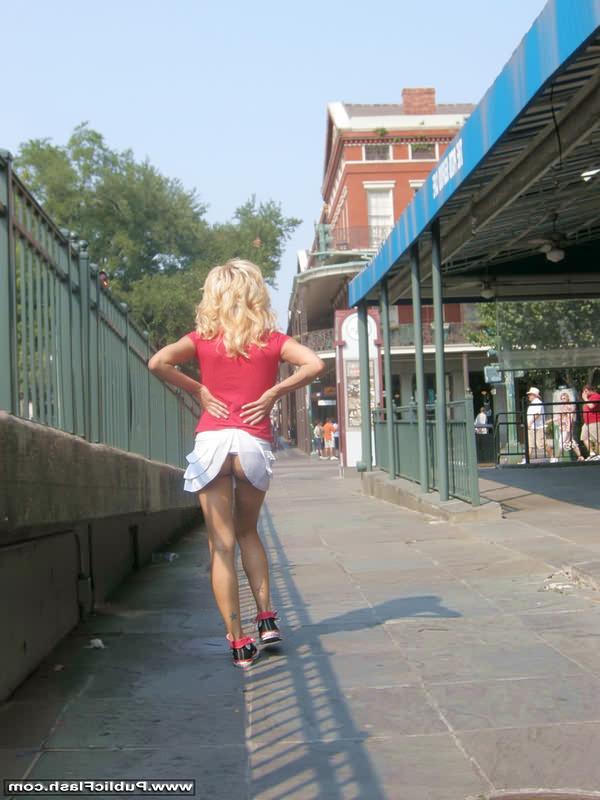 16P Sassy blonde tourist flashing her big fake boobs in New Orleans