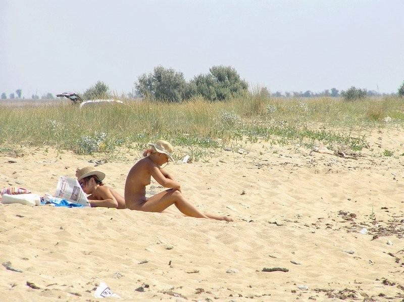12P Nudists having fun on the beach