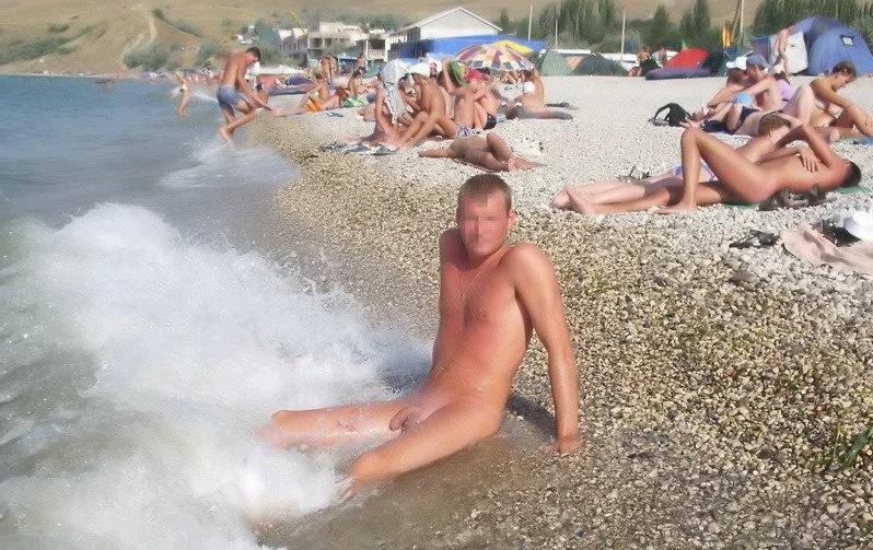 12P Lots of naked next door people on beach