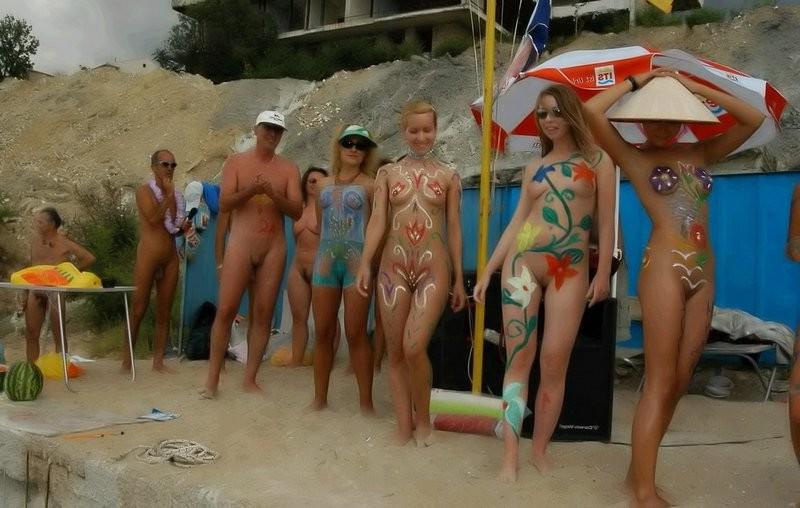 12P Nude nudists relaxing on the beach