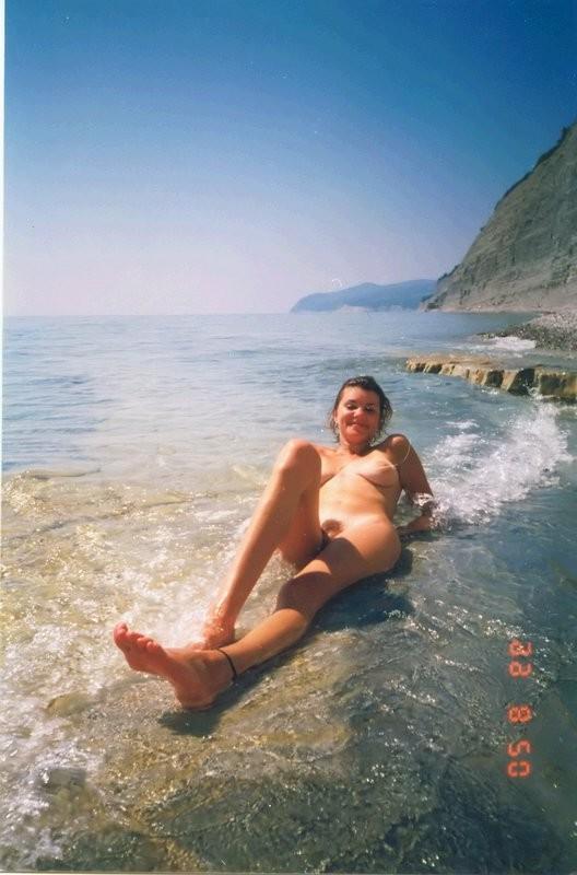 12P Nude nudists relaxing on the beach