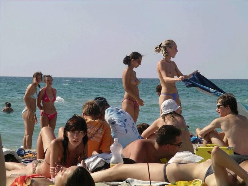 12P Nude nudists relaxing on the beach