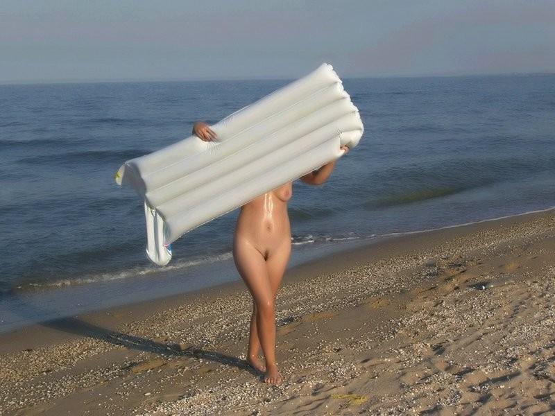 12P Nude nudists relaxing on the beach