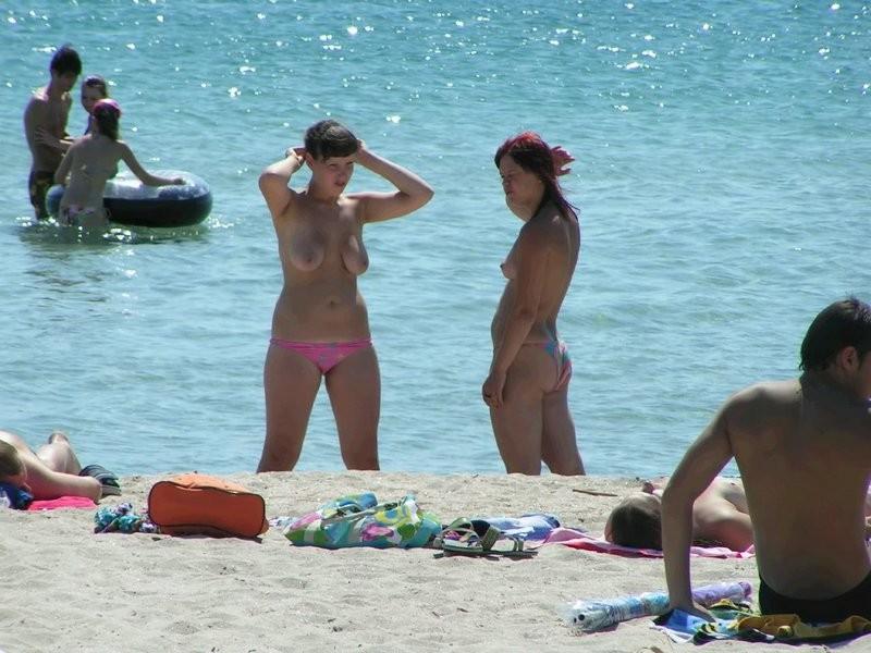 12P Nudists having fun on the beach