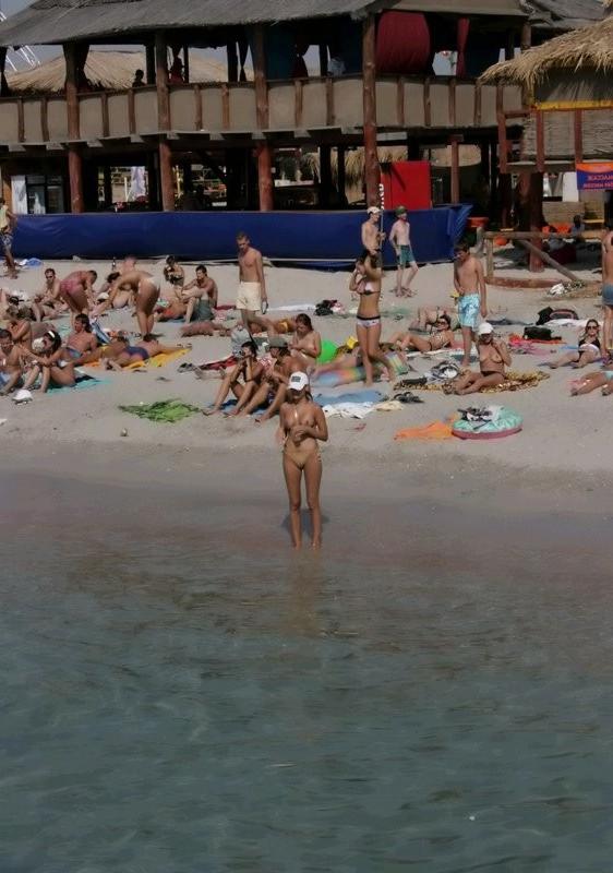 12P Nudists having fun on the beach