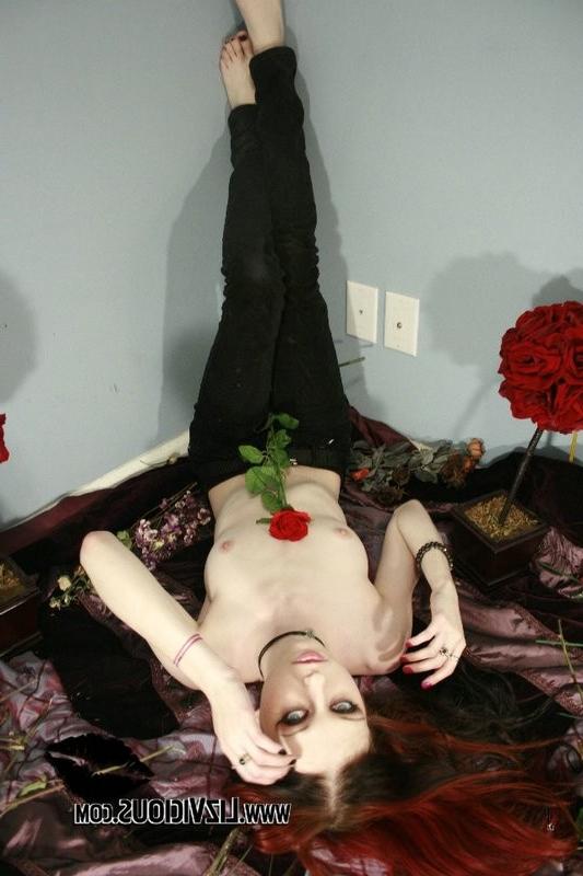 15P Emo punk chick with a flower shows off her pussy
