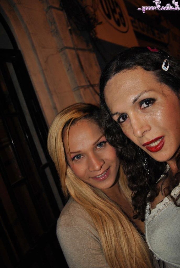 12P Nikki posing with a street prostitute