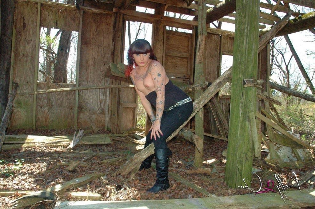 12P TS Kelly Clare posing and pissing in an abandoned house