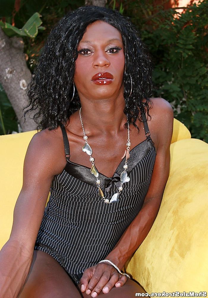 15P Black tranny beauty stroking her big fat hard cock