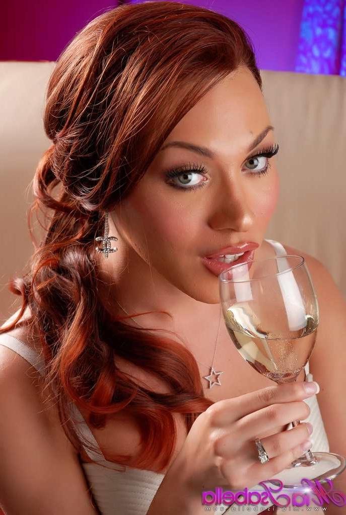 16P Gorgeous redhead shemale drinking champagne