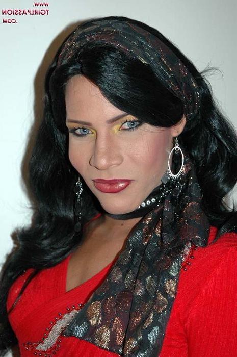 16P Crossdresser stripping from a tight red dress