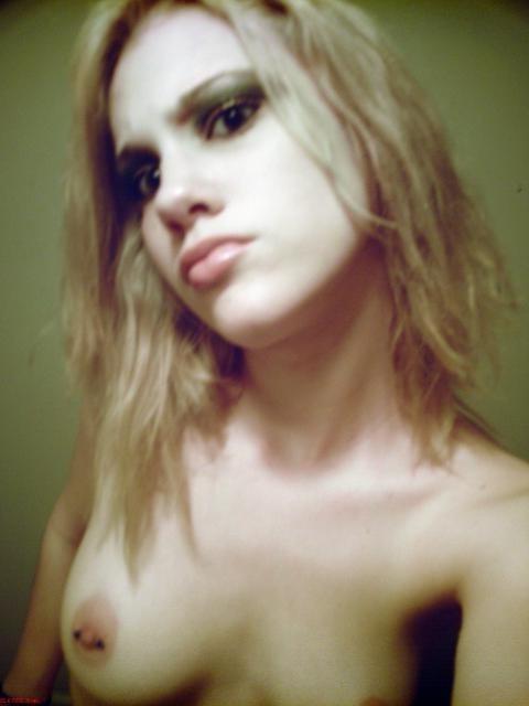 10P Frisky lady spied when shooting her naked boobs
