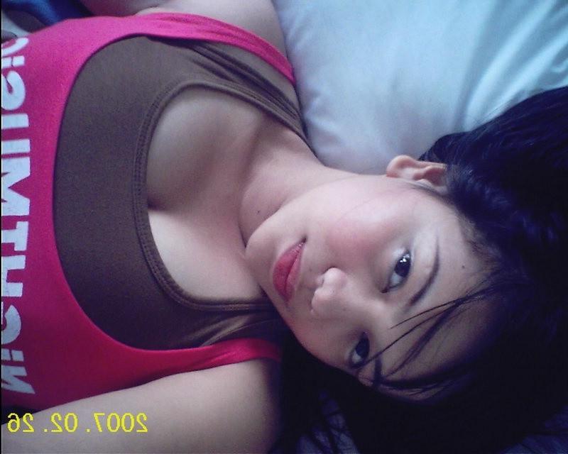 8P Cutie is great lying in sexy outfit before camera