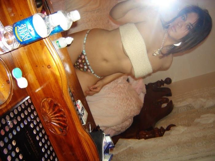 8P Asian girl parades in really small underwear