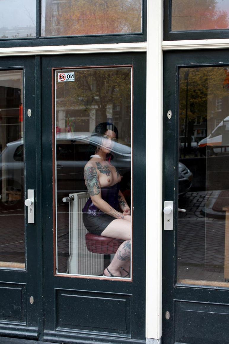 20P A leather clad tattooed amsterdam prostitute gets hardcored