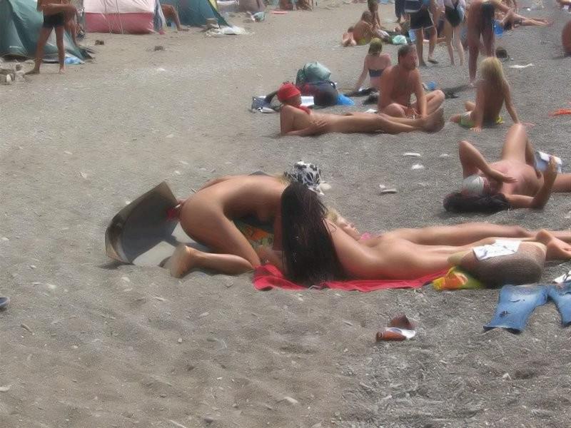 12P Nude nudists relaxing on the beach