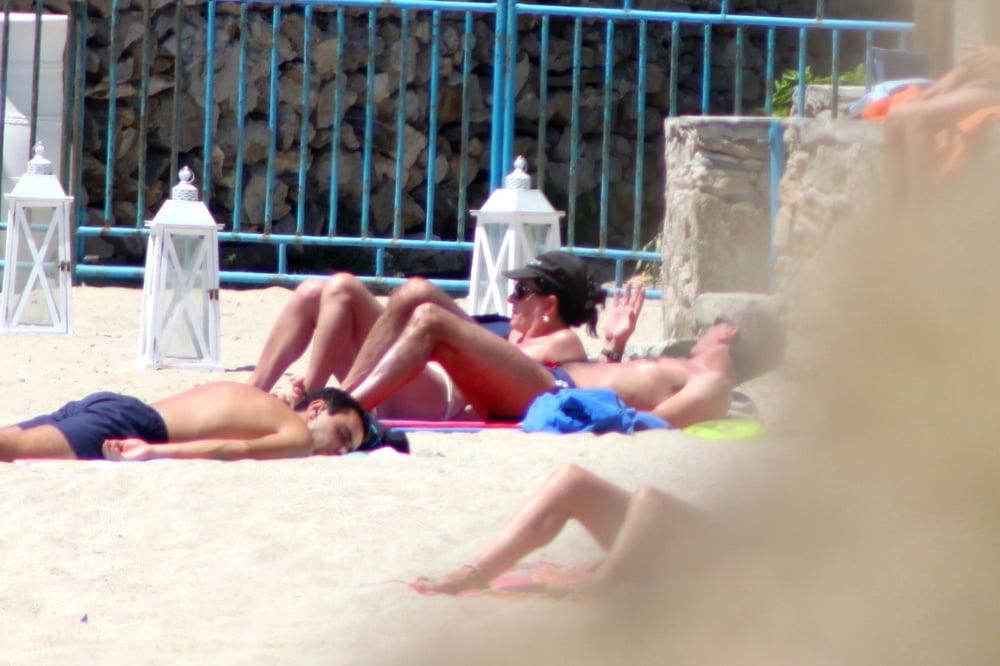 9P Italian mom white tits topless Mykonos beach