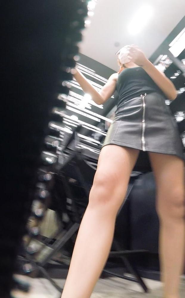 6P sexy redhead in a store