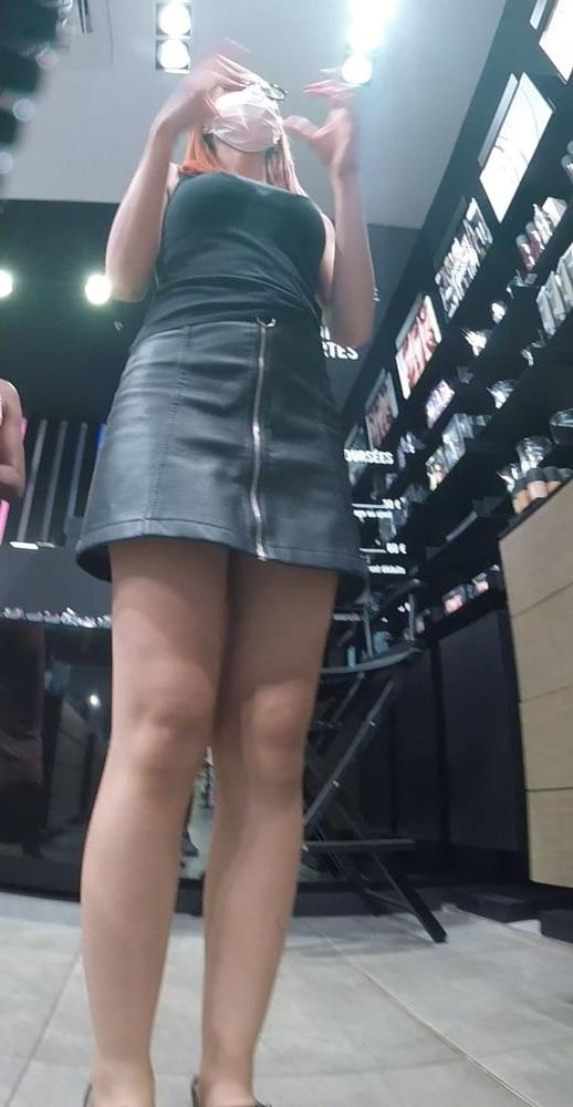 6P sexy redhead in a store