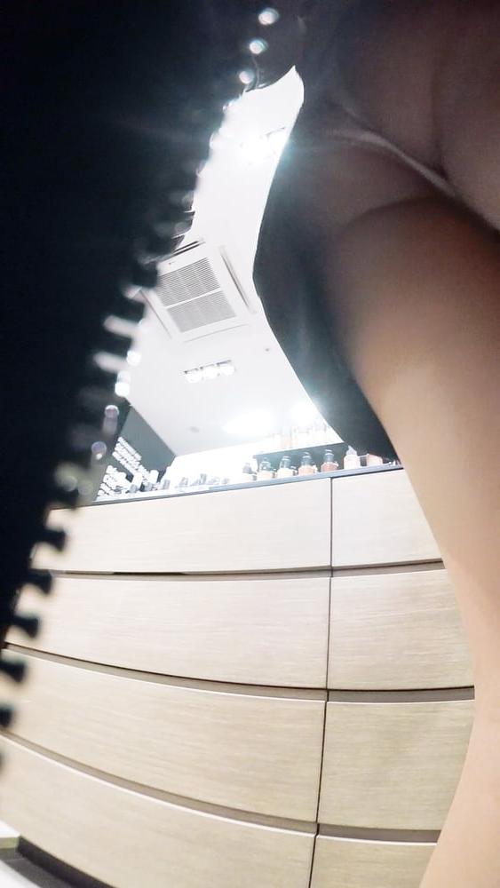6P sexy redhead in a store