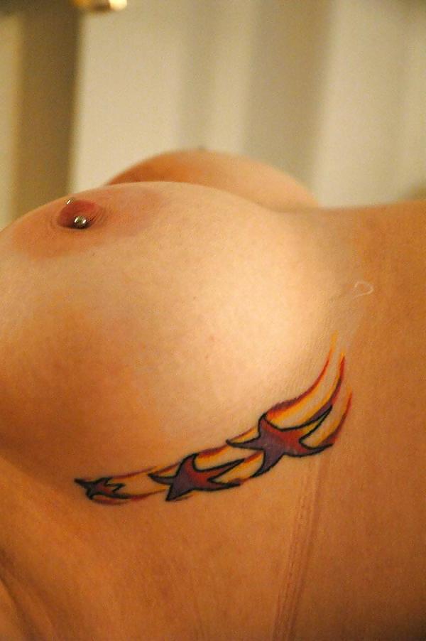 24P Pierced and Tattoos