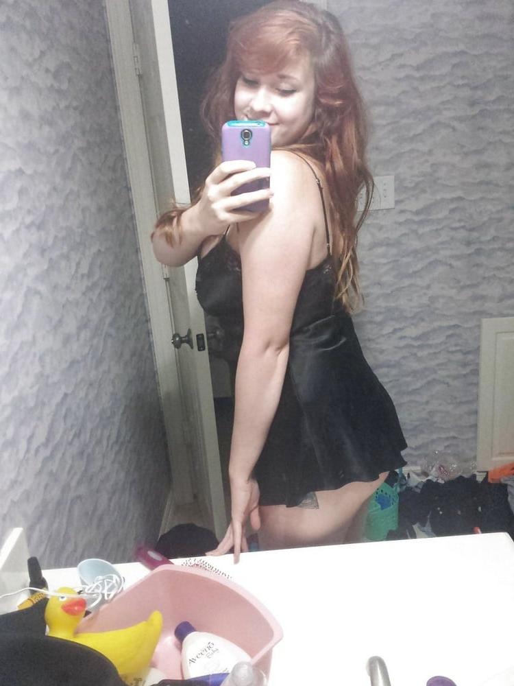 25P Amateur Redhead's Big Boobs
