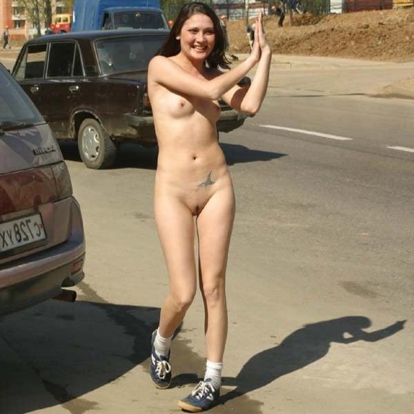 25P Naked woman walking down the street