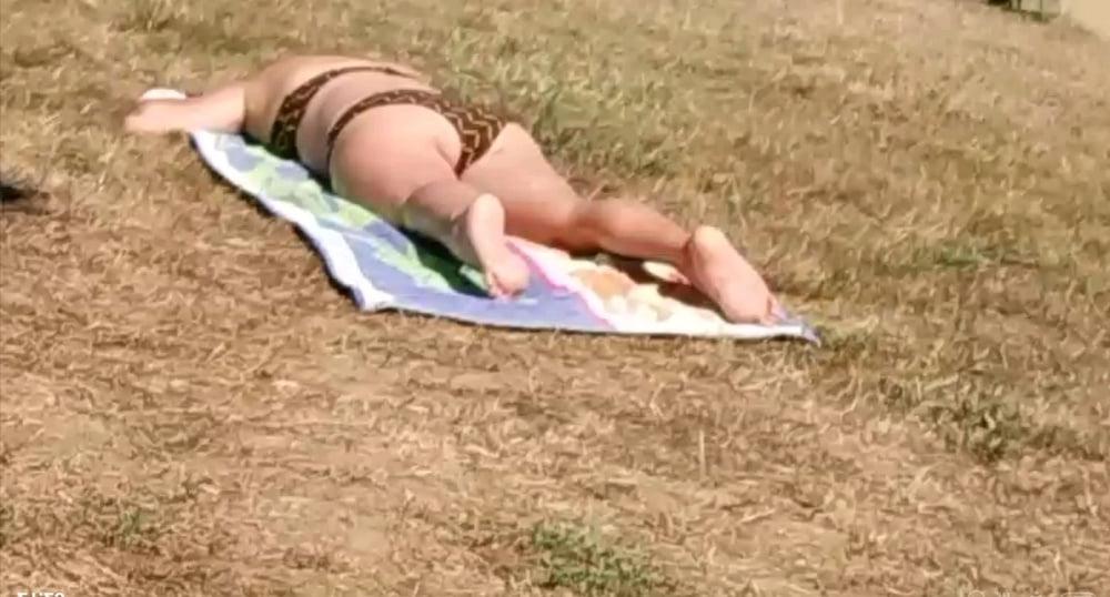 13P Spy sunbathing
