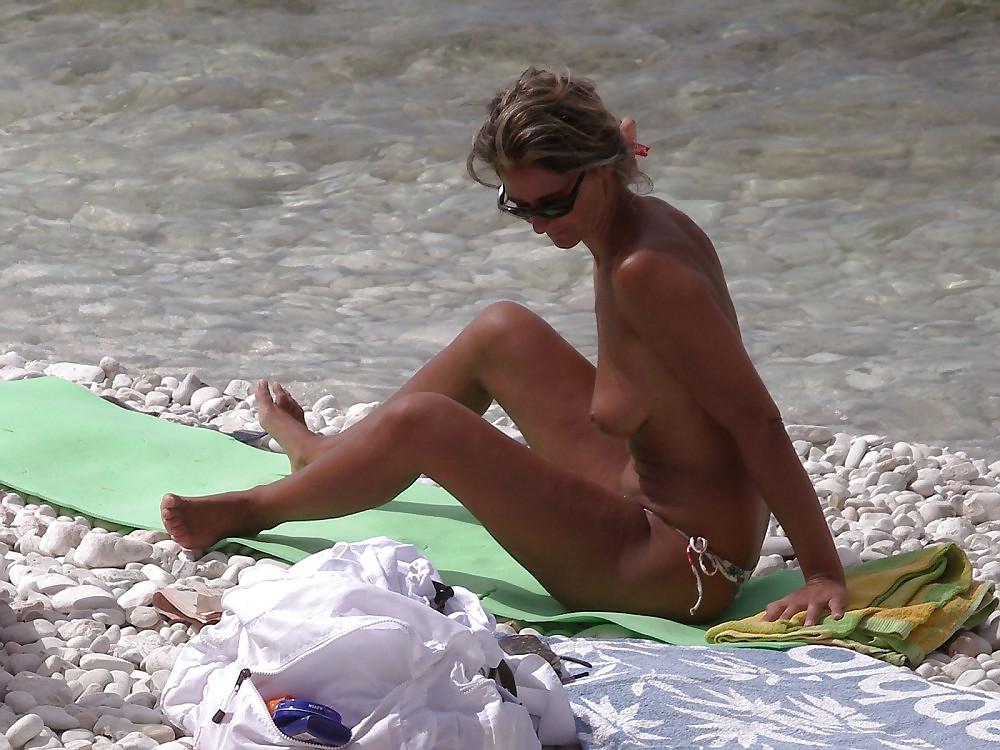 10P Mature Sunbathing Topless