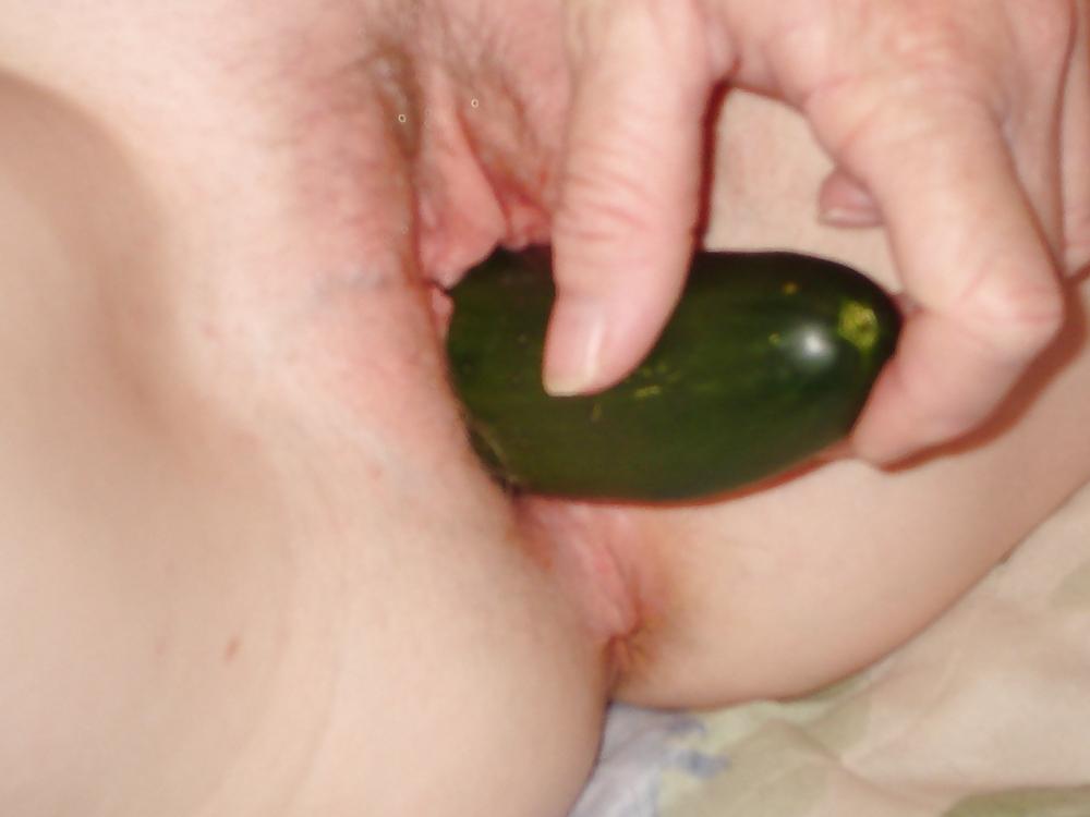 15P Wife with a cucumber and bedpost