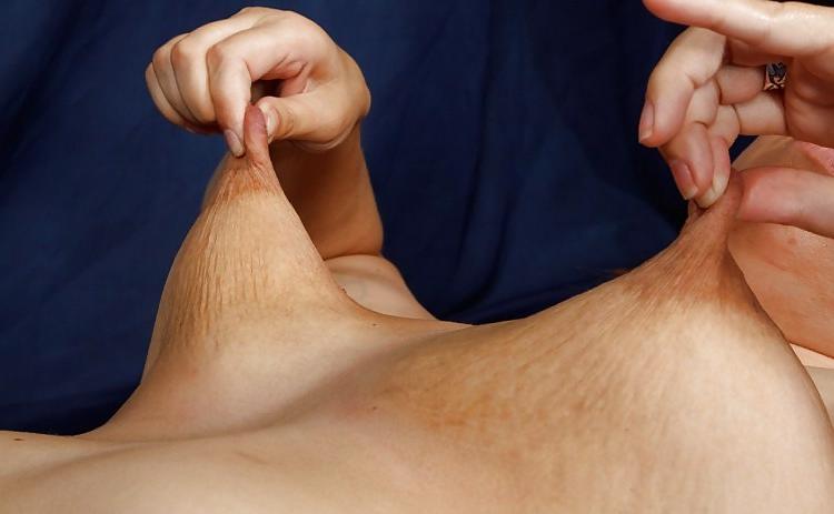 18P Girls pinching and pulling their nipples.
