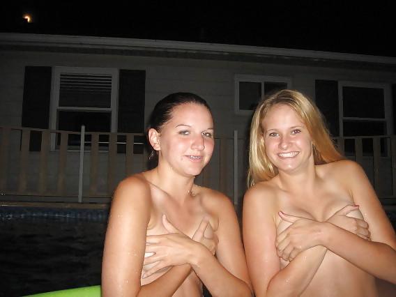 11P Naked girls playing in a pool by night