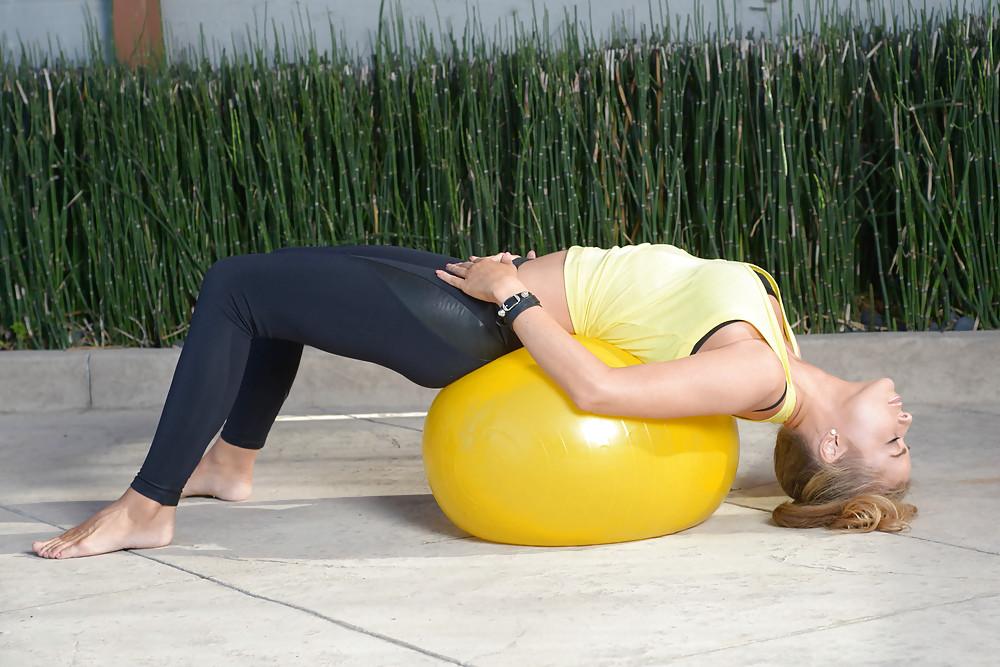 7P Carmen Electra plays with a ball