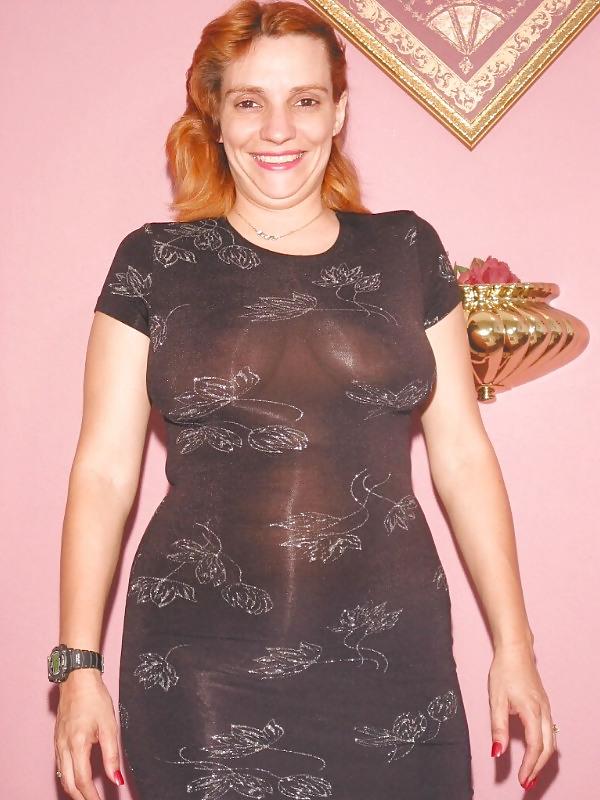 25P Mature pregnant redhead posing