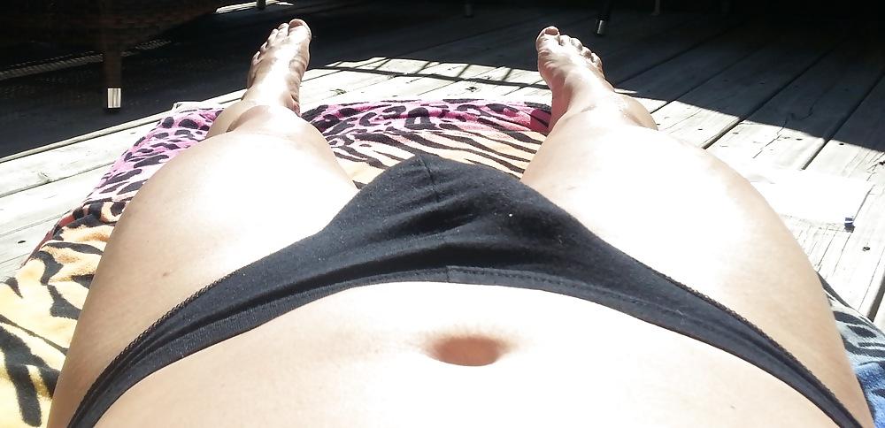 15P Tanning with my g-string feeling so horny in the sun!!!