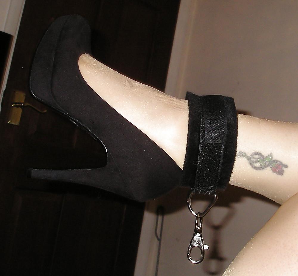 19P Tan tights and black heels