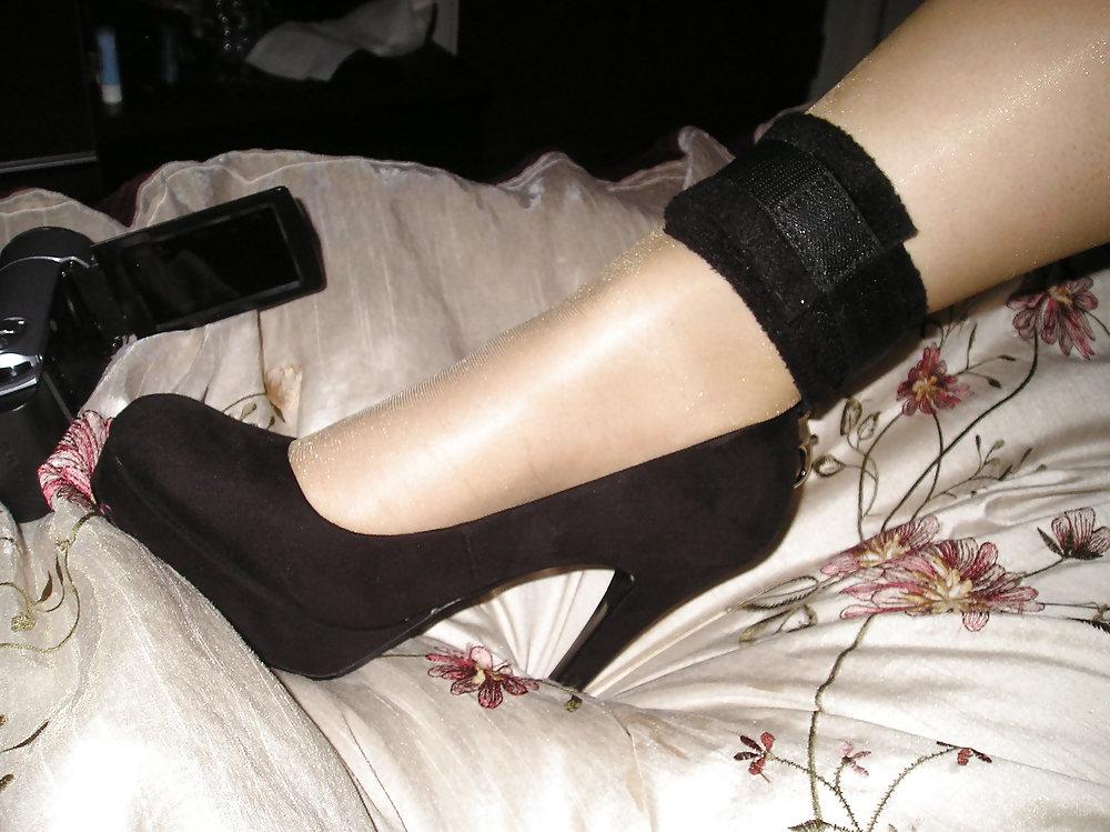 19P Tan tights and black heels