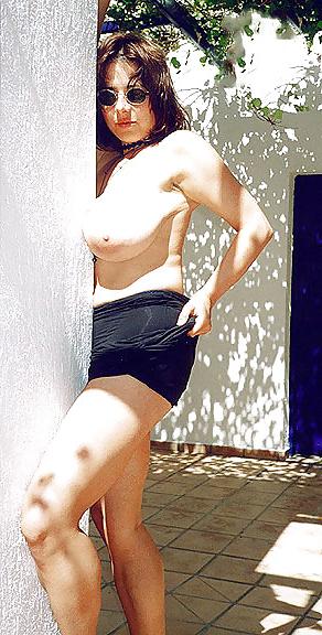 15P Naturally busty brunette posing in the sun