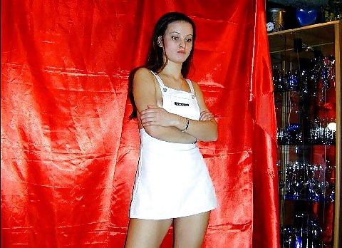 25P Brunette amateur Nadia posing around the house