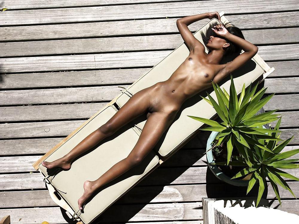 25P Naomi - sunbathing